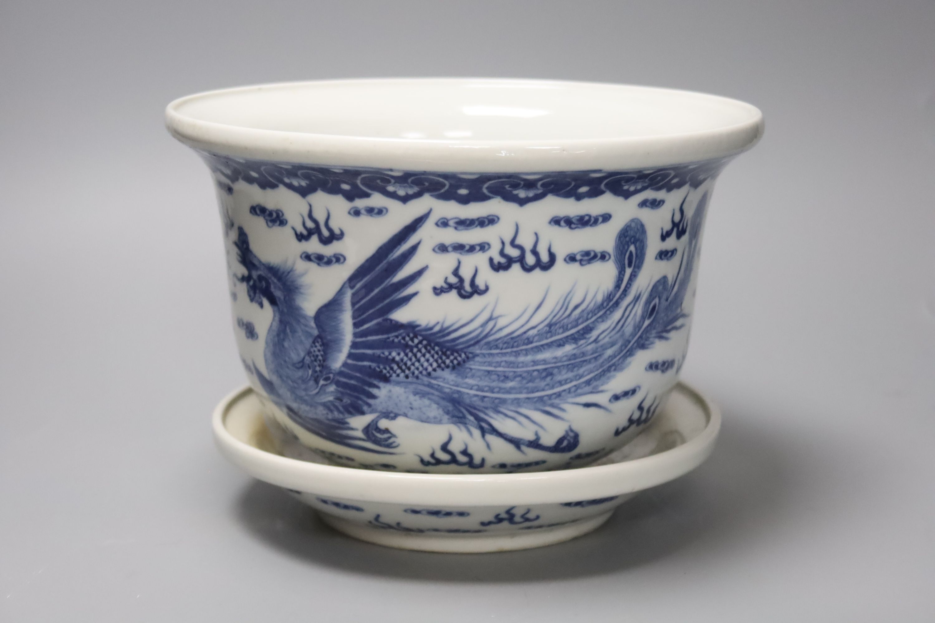 A 19th century Chinese porcelain jardiniere on stand